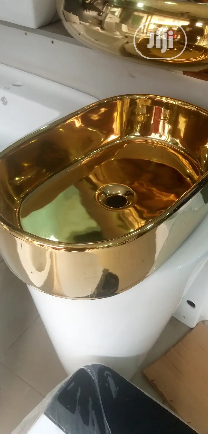 Gold Marble Top Basins.