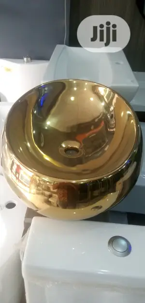 Gold Marble Top Basins.