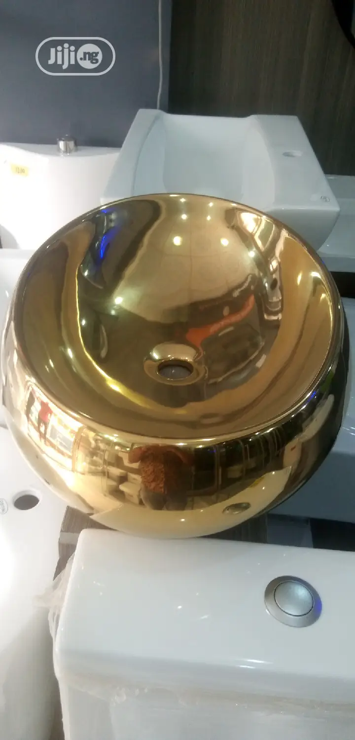 Gold Marble Top Basins.