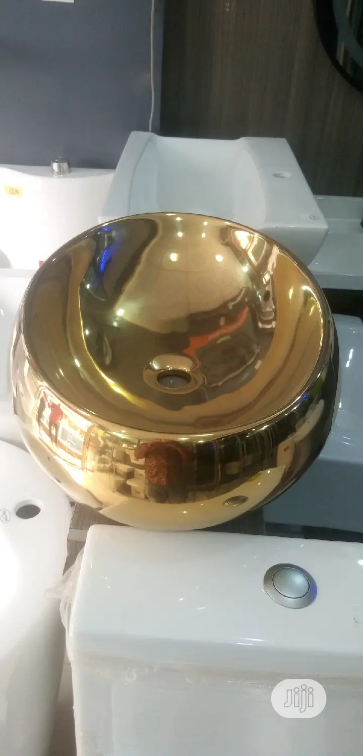 Gold Marble Top Basins.