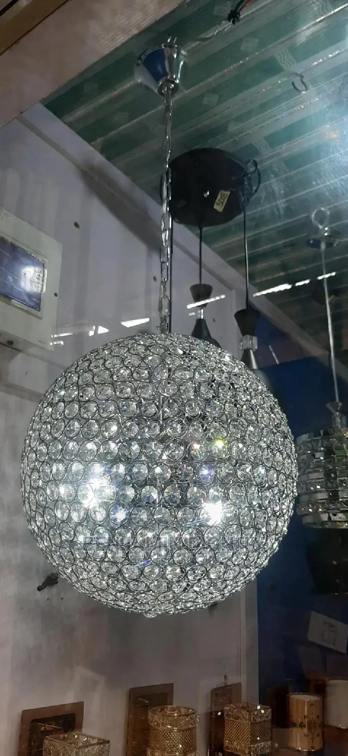 Rotationg Droped Crystal Pendant Light