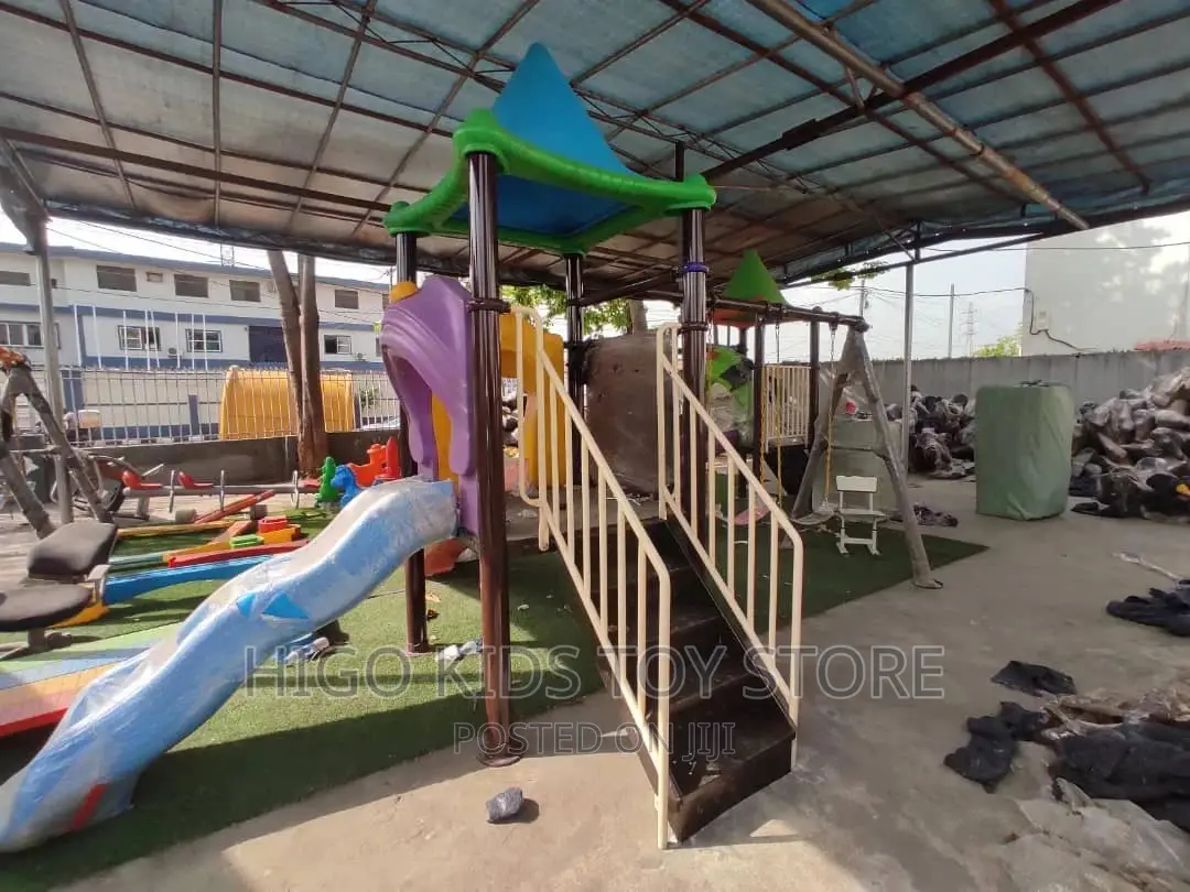 Playhouse With Multiples Slide And Swing
