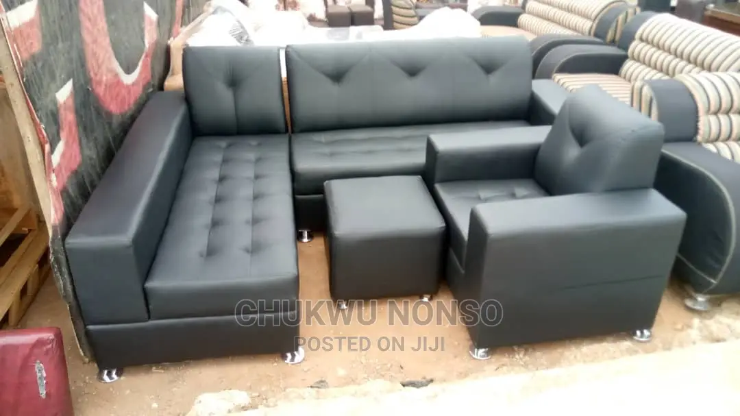 Black L- Shaped Leather Sofa With a Single