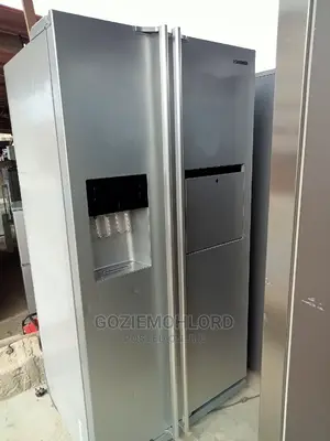 Photo - Clean Samsung Side by Side Fridge + Bar,Ice Water Dispenser