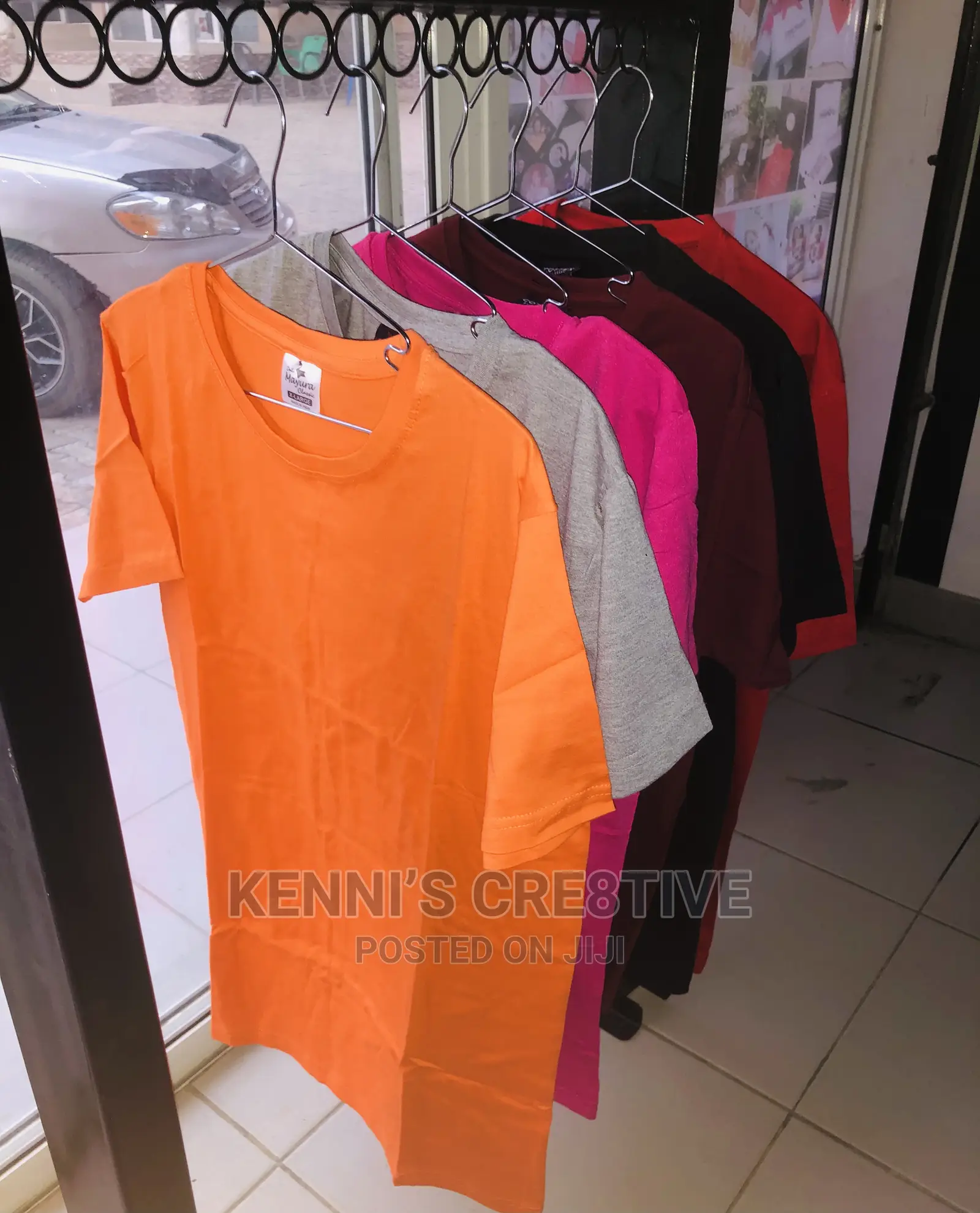Plain 5,000/ Customized T-Shirt 10,000
