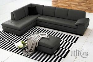 Sectional Sofa With Puff