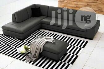 Sectional Sofa With Puff