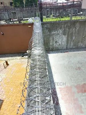 Perimeter Fencing; With Razor Security Barb-Wire