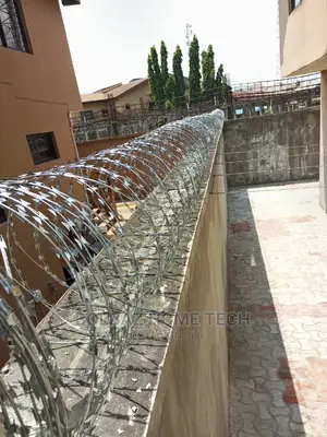 Perimeter Fencing; With Razor Security Barb-Wire
