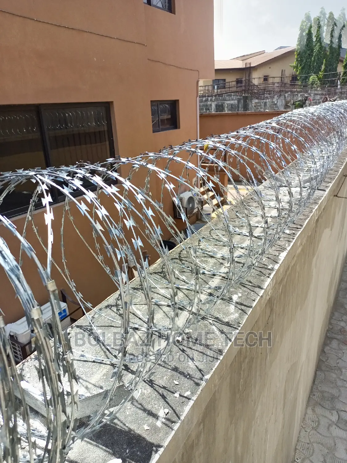 Perimeter Fencing; With Razor Security Barb-Wire