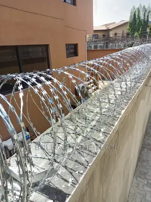 Perimeter Fencing; With Razor Security Barb-Wire