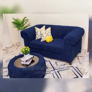 2seater Fabric Sofa With an Ottoman Designed With Glass Top