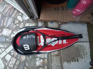 Photo - Wilson Tennis Racket Red and Black