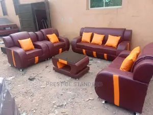 A Quality Well Made Leather Sofa With a Center Table,