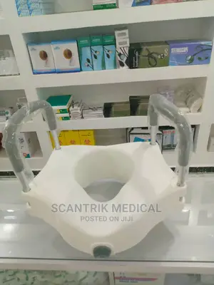 Raised Toilet With Padded Handle