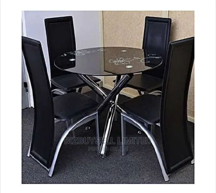 4 Seater Glass Dinning Table.