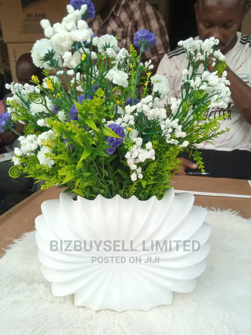 Table Flower With White Ceramic Vase