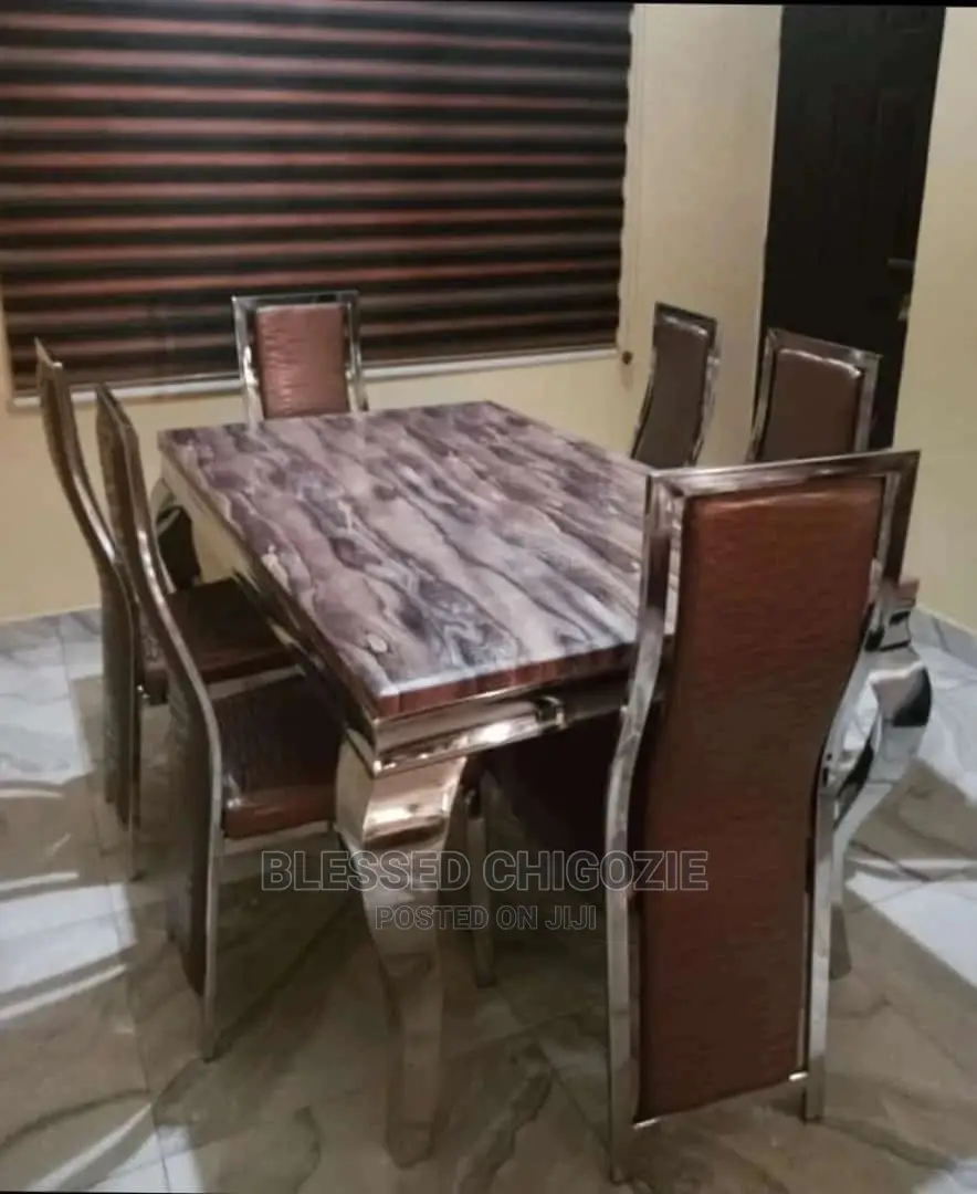 Modern 6 Seater Marble Top Dining Table Set.