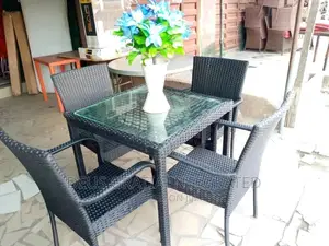 Outdoor/Ratan/Cain Chair And Table With Glass