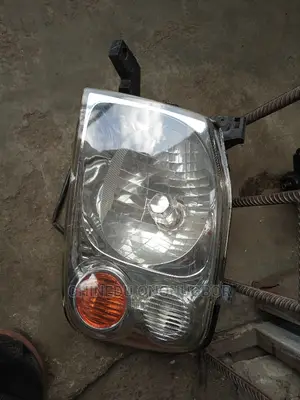 Nissan Frontier Left Headlight 2002