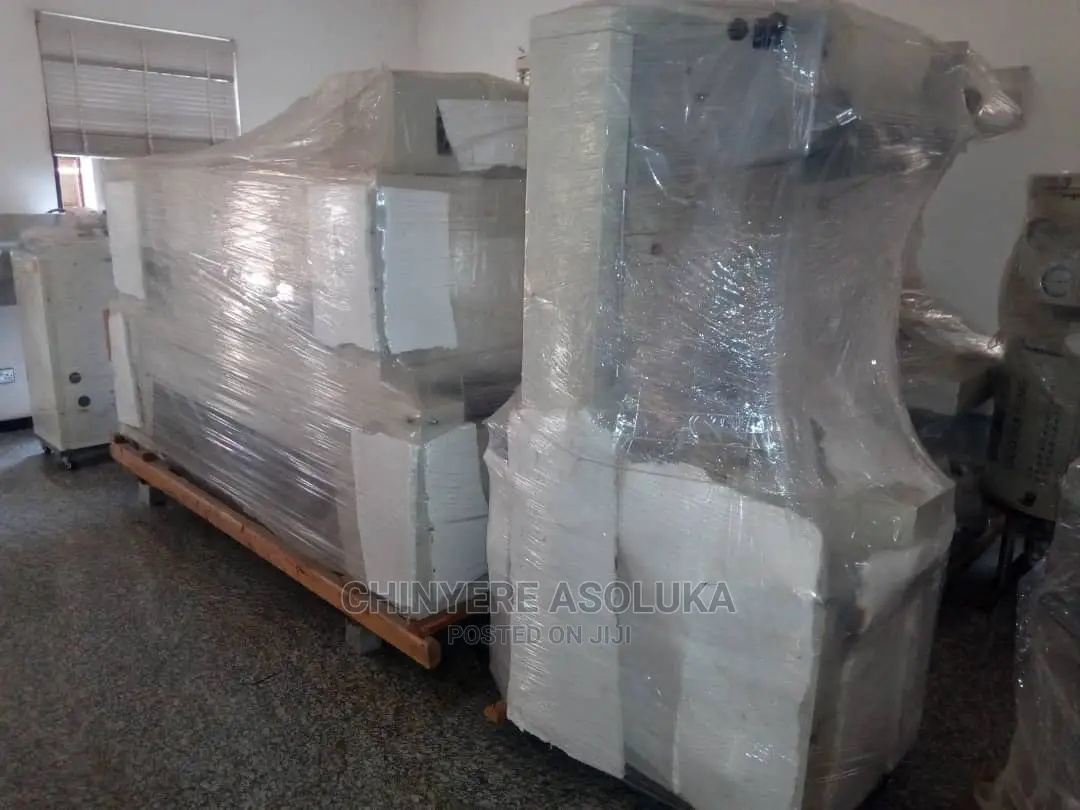 Semi Automatic Shrink Wrapping Machine.