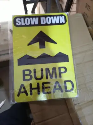 Slow Down Bumb Ahead Safety Sign