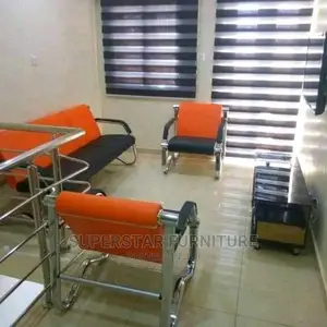 Tovic Orange and Black Sofa Chairs