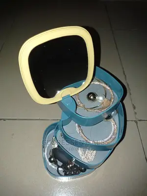 Rotating Jewelry Organizer Box With Mirror