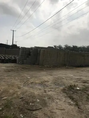 Half Plot of Land Facing Express