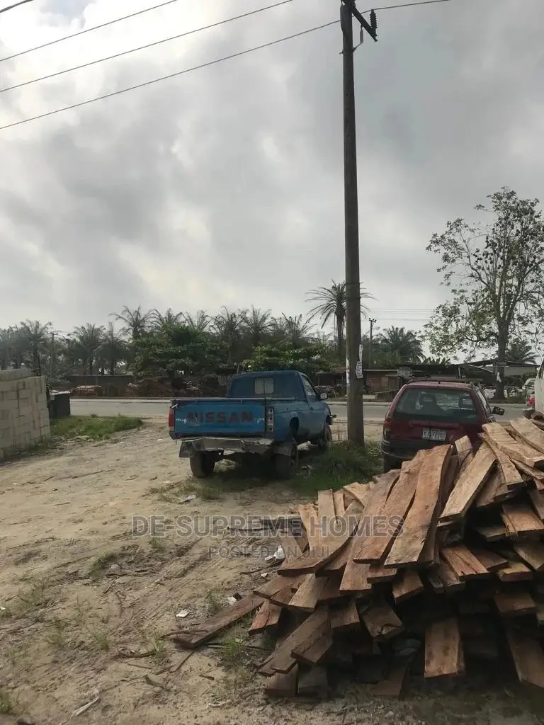 Half Plot of Land Facing Express