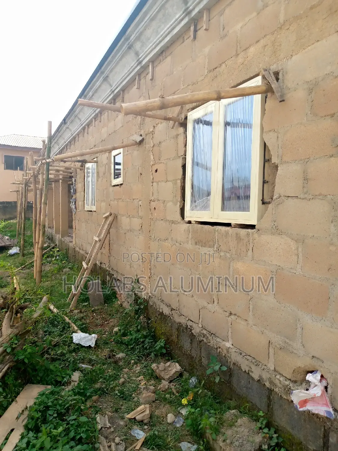 Casement Windows With Cream Color and Net