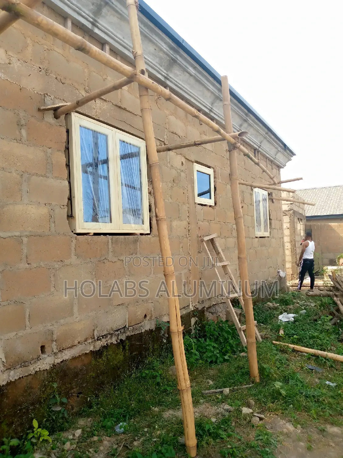Casement Windows With Cream Color and Net