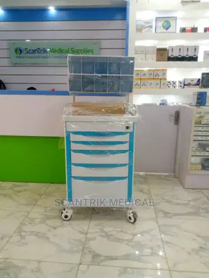 Doctors Nurses Using Medical Anesthesia Trolley
