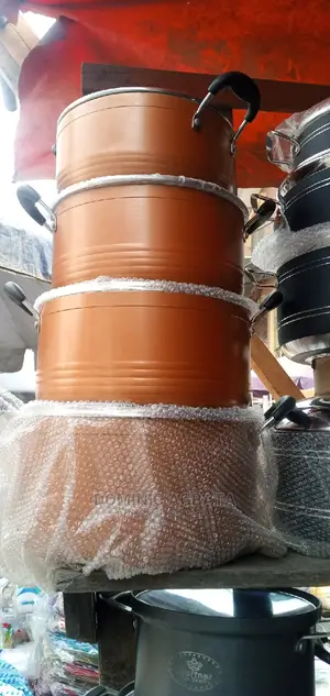 4 Sets Of Pots Brown