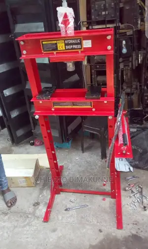 A hydraulic press is a device used to press out materials, aiding facilities in fabrication, assembly and maintenance. It employs pressure generated by a pump to push a steel cylinder into a material at a set force.
