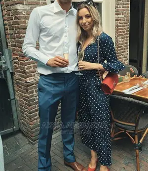 Polka Dot Tiered Trumpet Sleeve Wrap Jumpsuit
