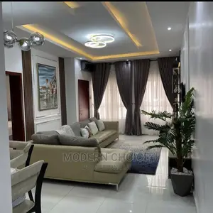 Modern L-Shaped Sofa With Throw Pillows