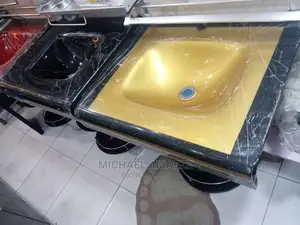 Black and Gold Basin With Mirror
