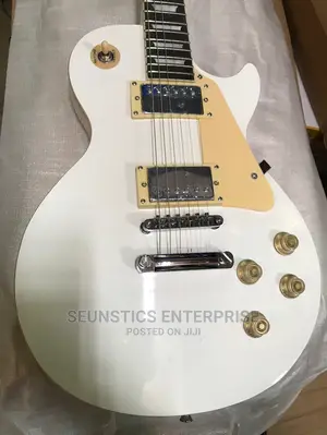 White Gibson Les Paul Style Guitar