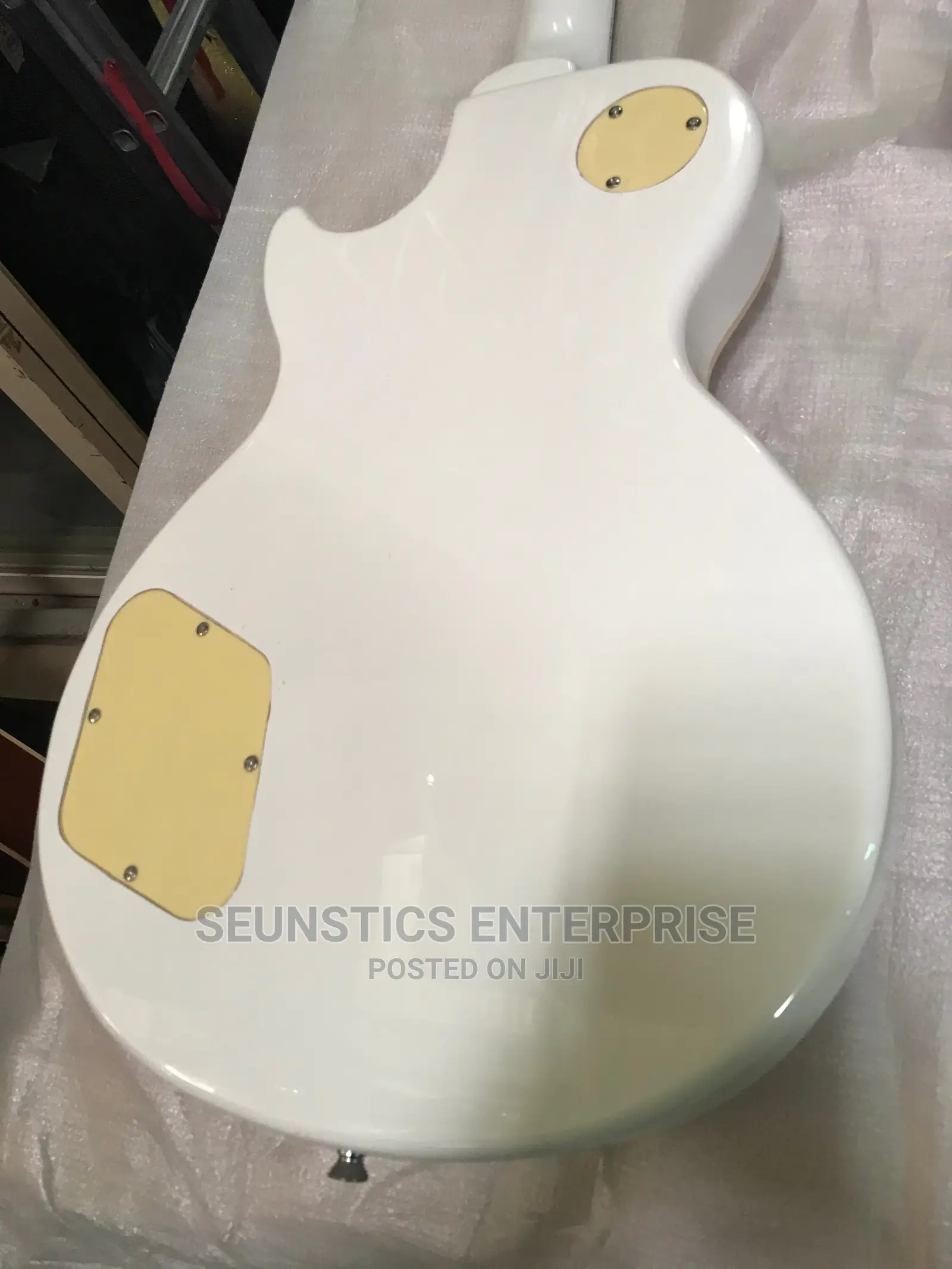 White Gibson Les Paul Style Guitar
