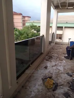 Frameless Balcony With Grey Glass