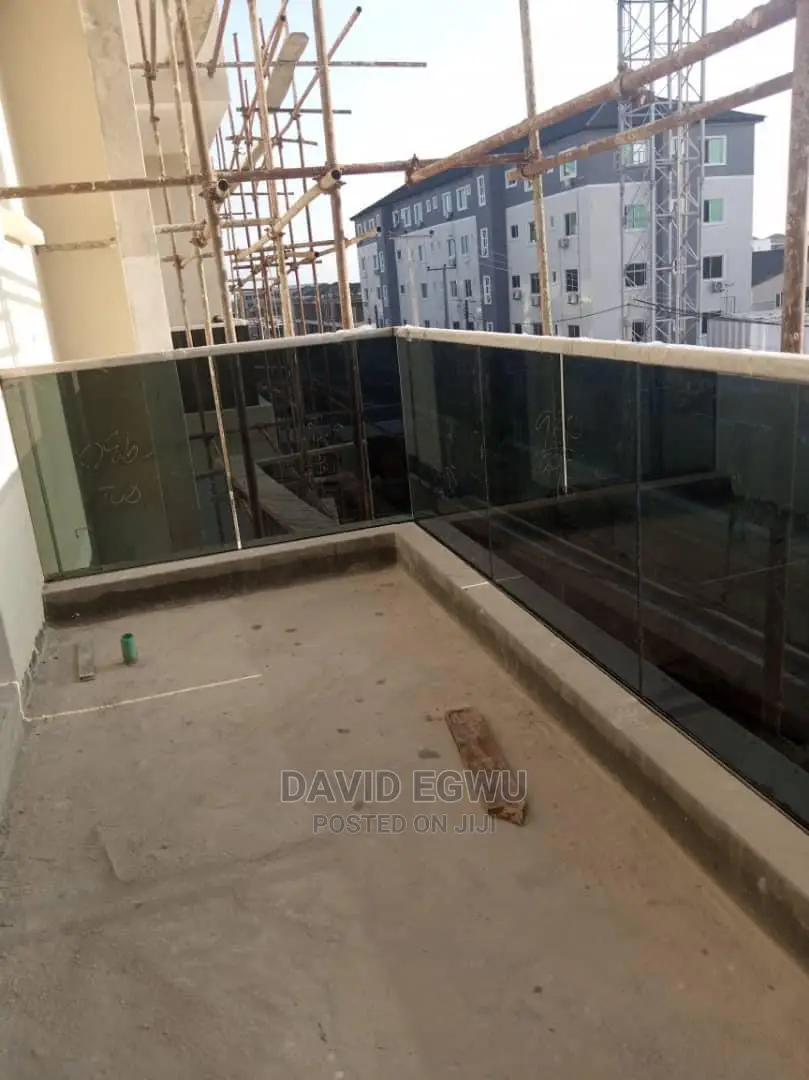 Frameless Balcony With Grey Glass
