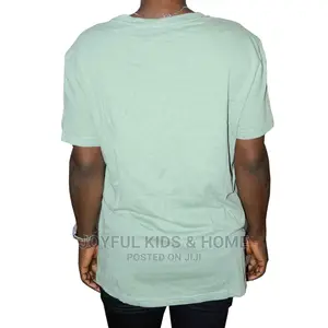 Ladies/ Teenagers Top-Cartoon,Green Color and Black