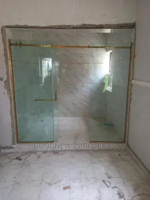 Gold Frameless Shower Glass