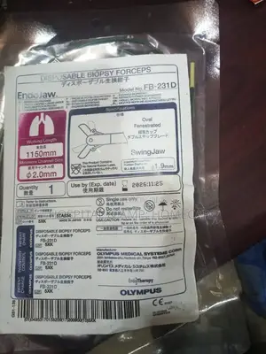 Photo - Olympus Endoscope Biopsy Forceps and Brushe