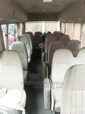 Toyota Coaster 2013 Gold