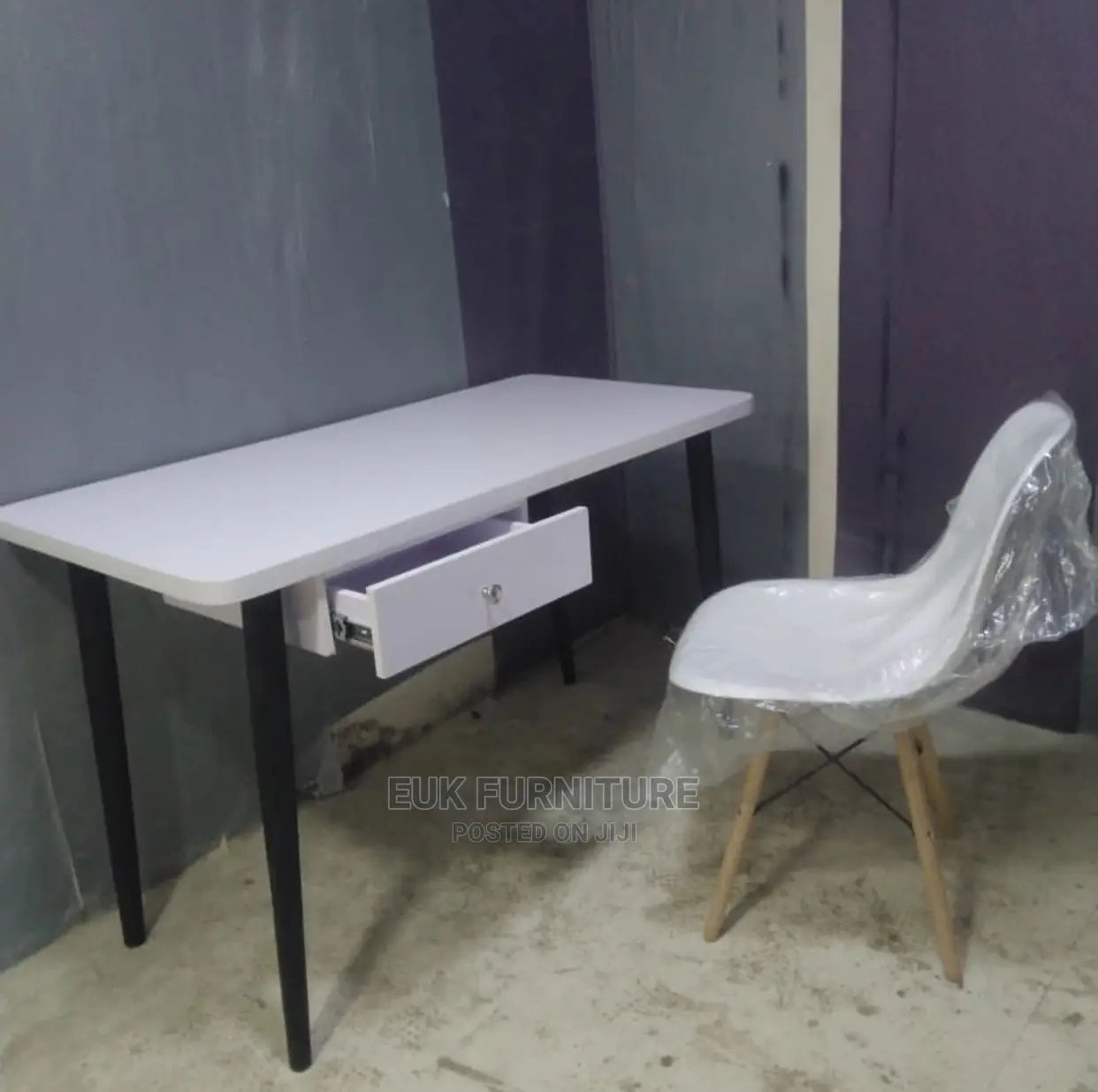 Unique Table and Eames Chair