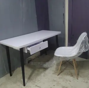 Unique Table and Eames Chair