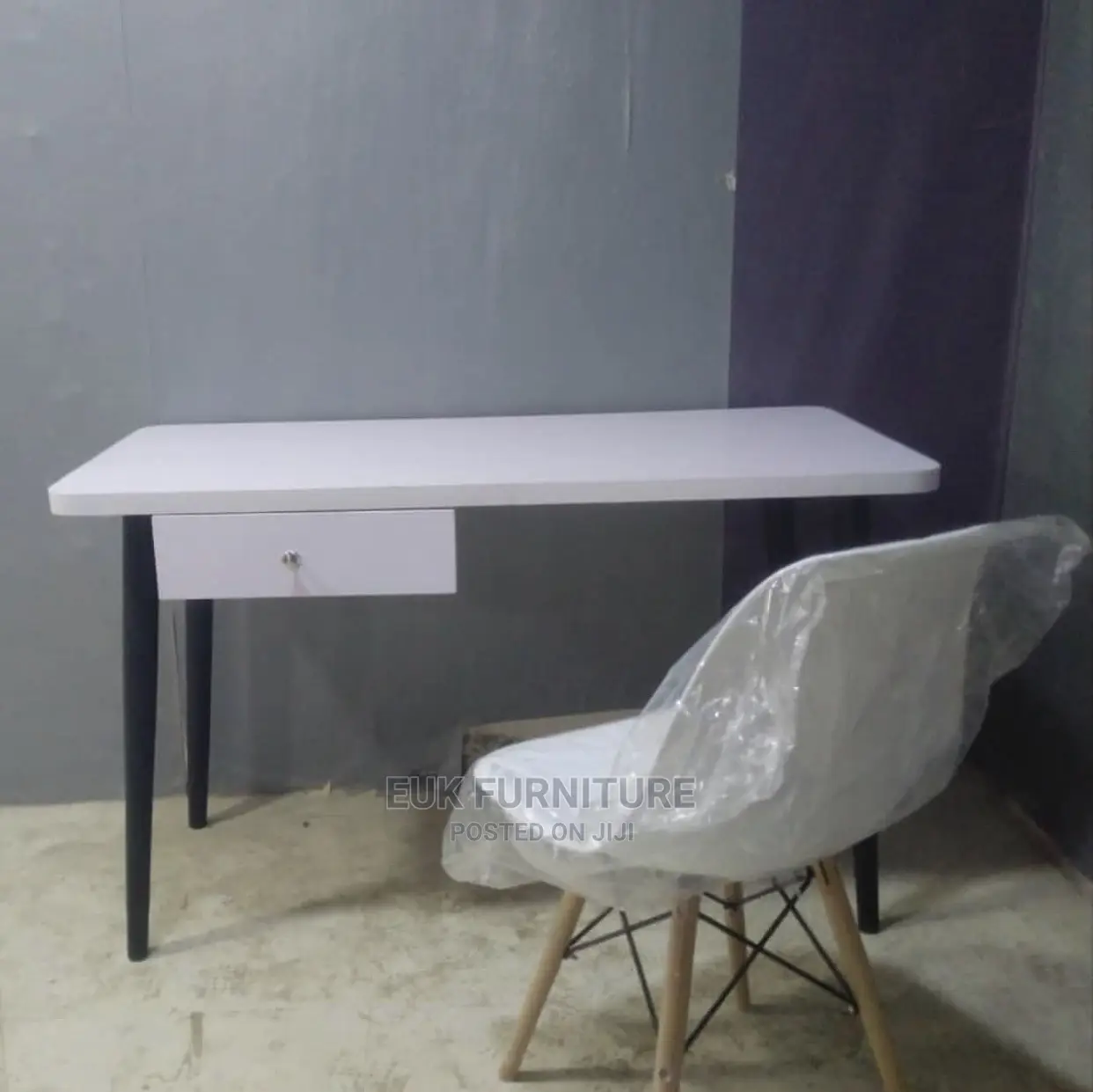 Unique Table and Eames Chair