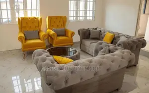 A Standard Sofa With Center Table